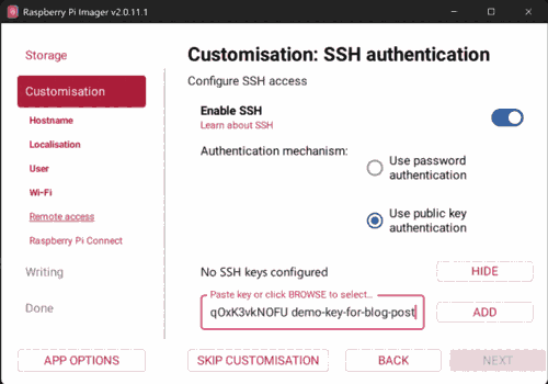 Raspberry Pi Imager's SSH authentication screen, showing the option to log in with a password versus allowing public-key authentication only, with an example public key populated